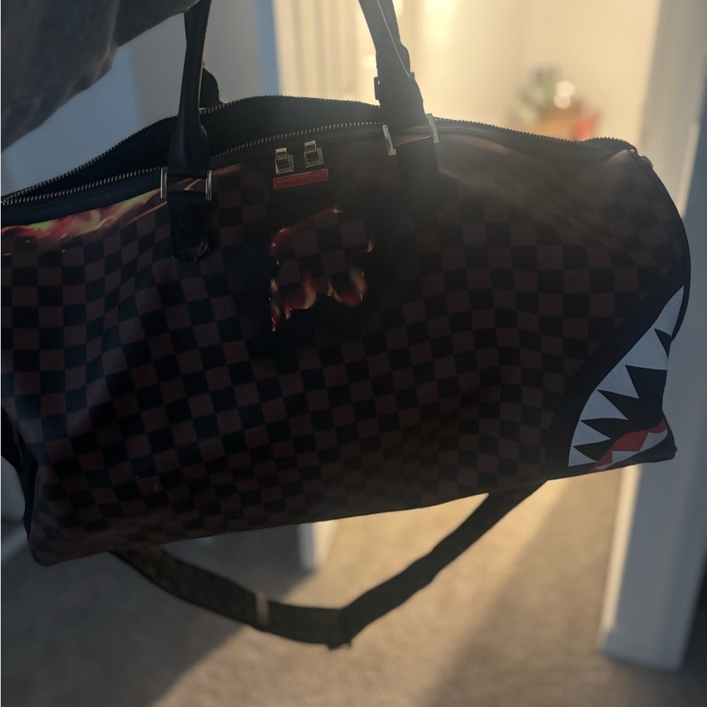 Sprayground Checkered Black and Brown duffle Bag